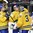 COLOGNE, GERMANY - MAY 20: Sweden's Elias Lindholm #28, Joel Eriksson Ek #22 and Henrik Lundqvist #35 celebrate after a 4-1 win over team Finland during semifinal round action at the 2017 IIHF Ice Hockey World Championship. (Photo by Matt Zambonin/HHOF-IIHF Images)

